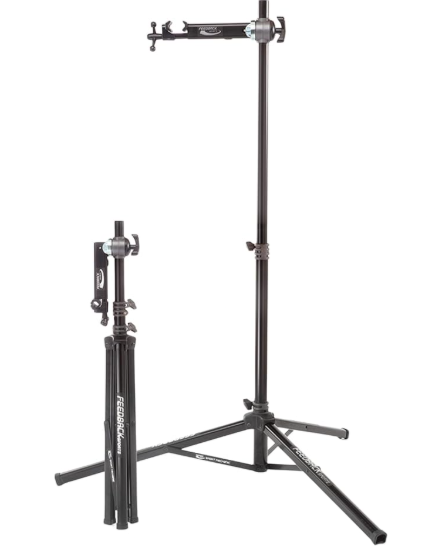 Feedback Sports Sport-Mechanic Bike Repair Stand holding a bicycle