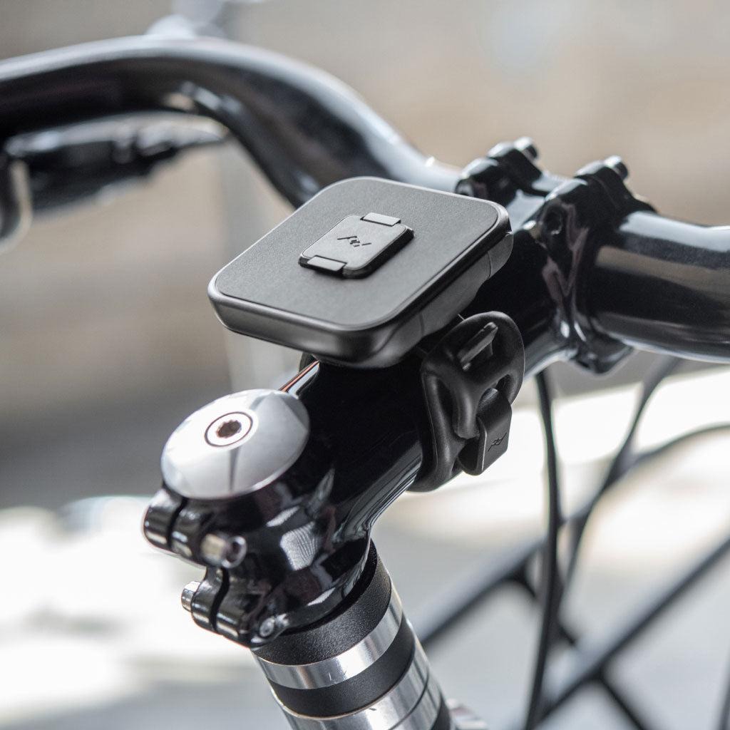 Peak Design Universal Bar Mount attached to bicycle handlebars close to the stem.
